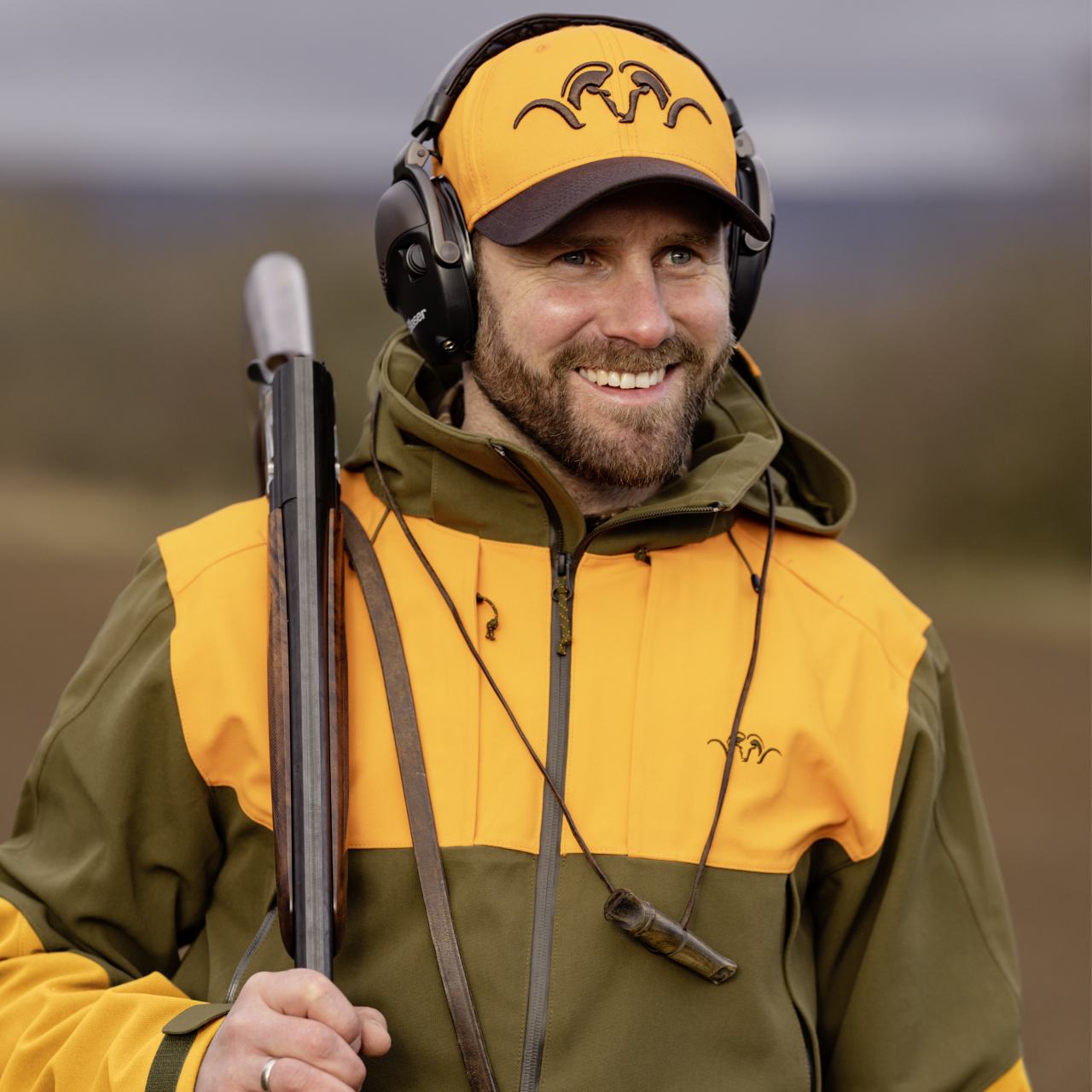 Blaser Herren Striker Jacke dunkel olive / blaze orange