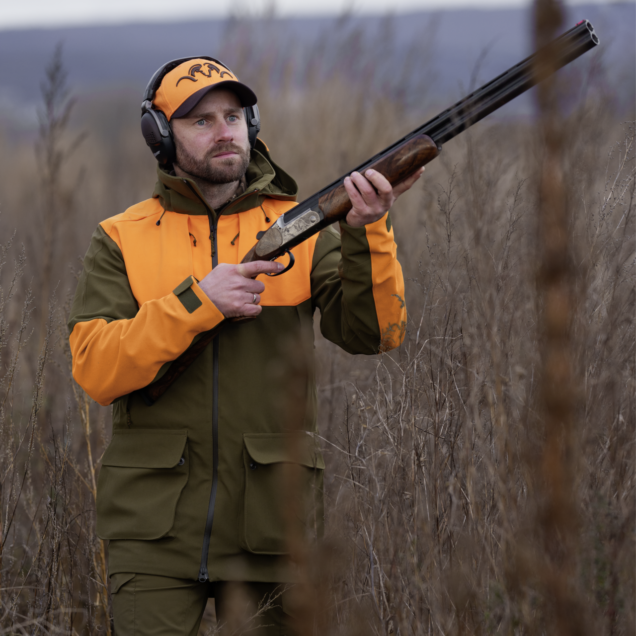 Blaser Herren Striker Jacke dunkel olive / blaze orange